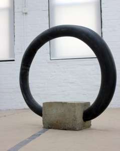 Jeff Feld; A failure of the day to day (Front view); 2014; Inner tube, concrete 